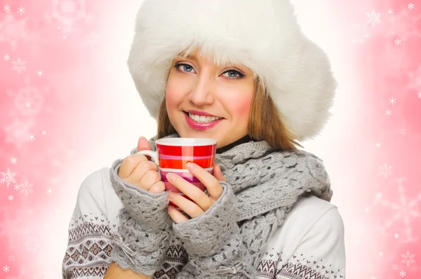 Young girl with sweater and mug — Stock Photo, Image