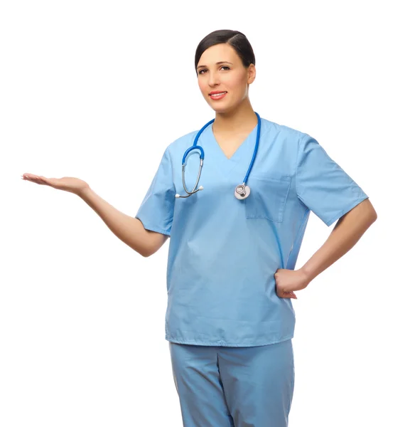 Young doctor showing welcome gesture — Stock Photo, Image