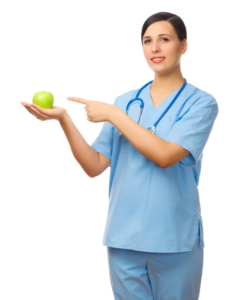 Jeune médecin avec pomme — Photo