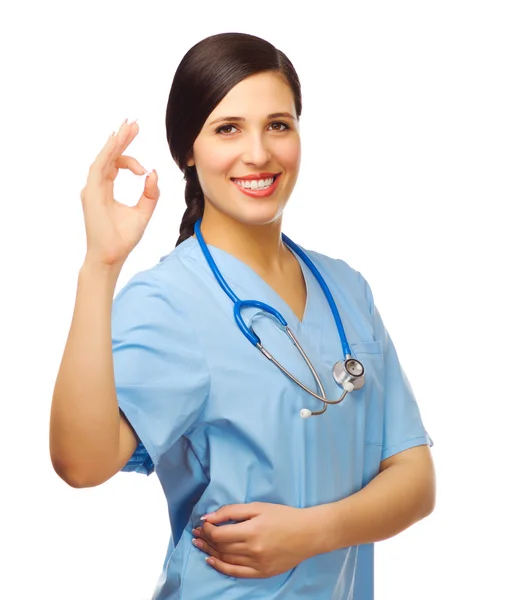 Молодой успешный врач показывает хорошо жест — стоковое фото