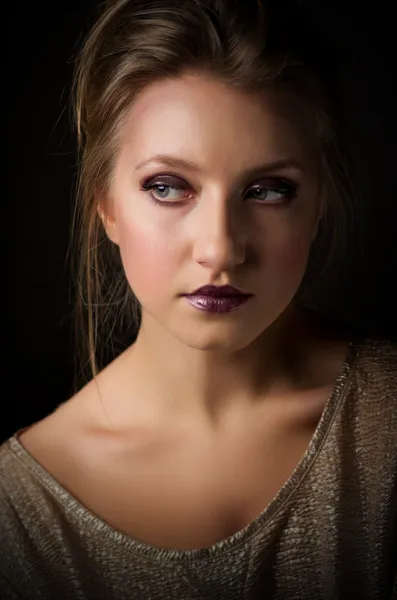 Portrait of young girl on grey — Stock Photo, Image