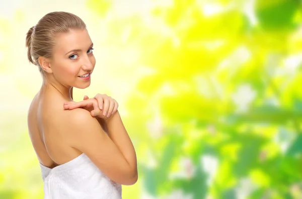 Young healthy girl on spring background — Stock Photo, Image