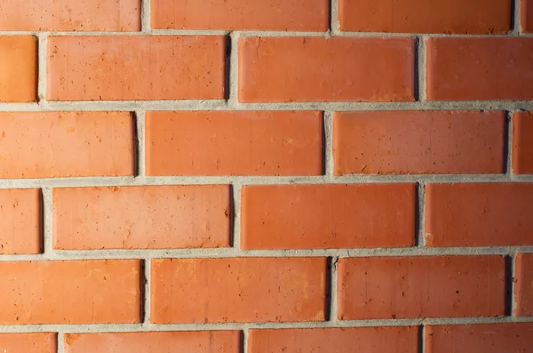Red brick wall with gradient light — Stock Photo, Image