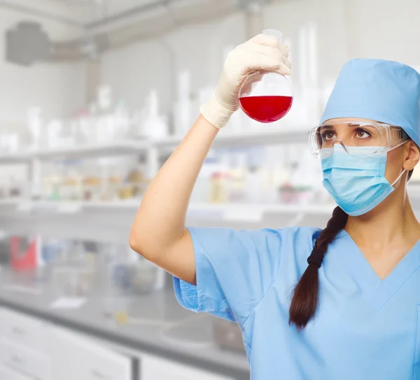 Chemist with test tube — Stock Photo, Image