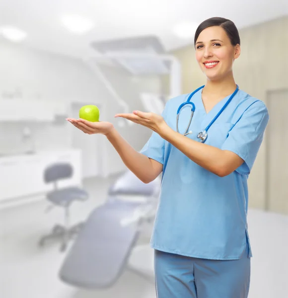 Doctor with apple — Stock Photo, Image