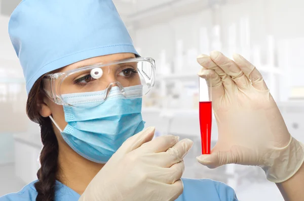 Doctor with vial — Stock Photo, Image