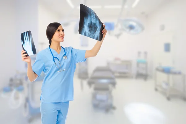 Doctor with x-rays — Stock Photo, Image