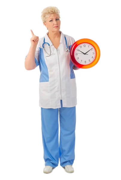 Docteur mature avec horloge — Photo