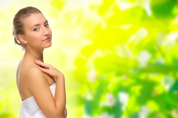 Young girl on floral background — Stock Photo, Image