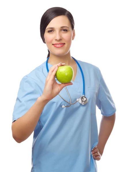 Doctor with green apple Stock Image