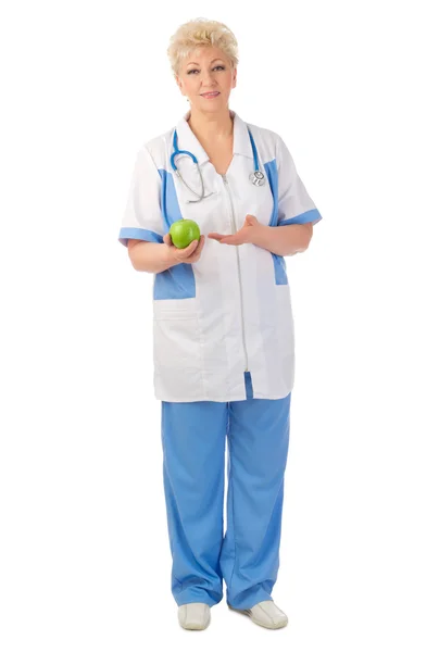 Mature doctor with apple — Stock Photo, Image