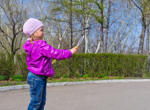 Little girl with soap bubbles — Stock Photo, Image