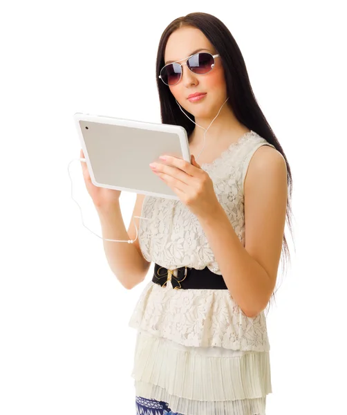 Young girl talks by tablet PC — Stock Photo, Image