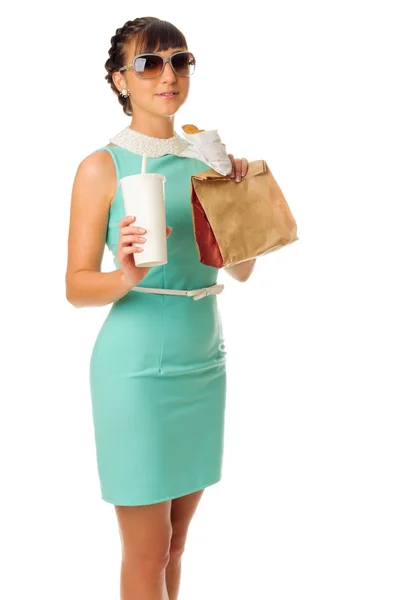 Glamorous girl in turquoise dress holds snacks — Stock Photo, Image