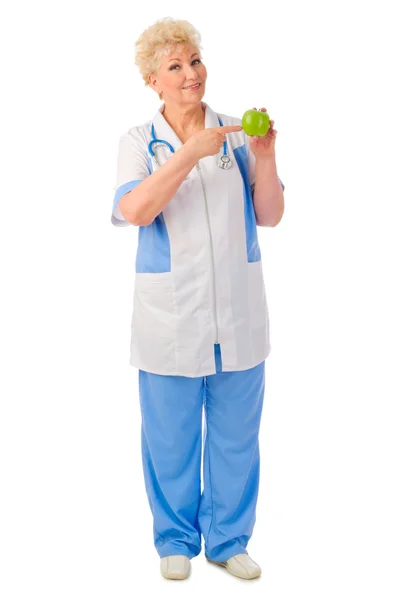 Mature doctor with green apple — Stock Photo, Image