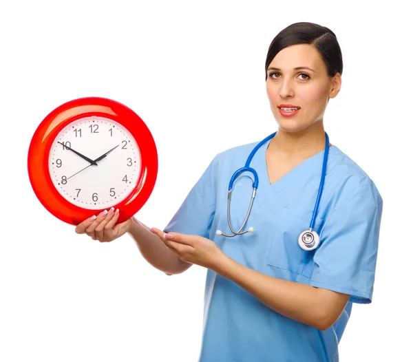 Giovane medico con orologio — Foto Stock