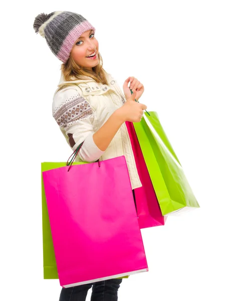 Young girl with bags shows ok gesture — Stock Photo, Image