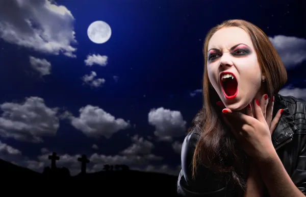 Vampire girl on night sky — Stock Photo, Image