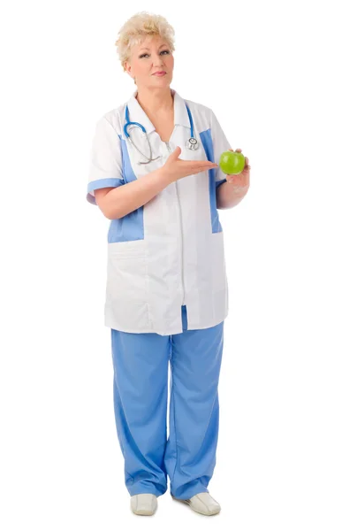 Mature doctor with apple — Stock Photo, Image