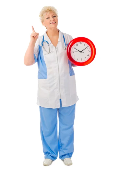 Docteur mature avec horloge — Photo