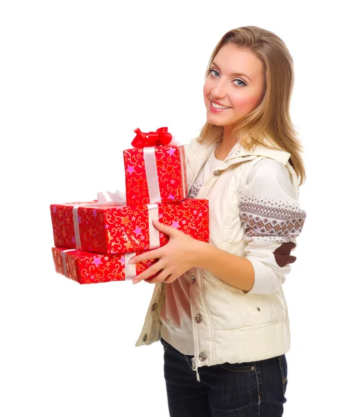 Молодая девушка с подарочными коробками — стоковое фото