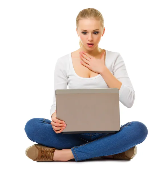 Surprised girl with laptop — Stock Photo, Image