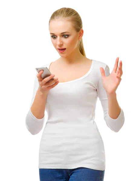Verrast meisje met mobiele telefoon — Stockfoto