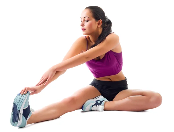 Young girl doing gymnastic exercises — Stock Photo, Image