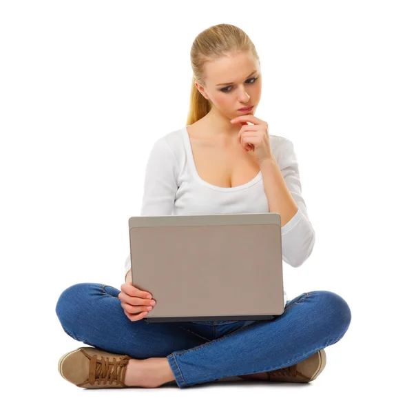 Worried girl with laptop — Stock Photo, Image