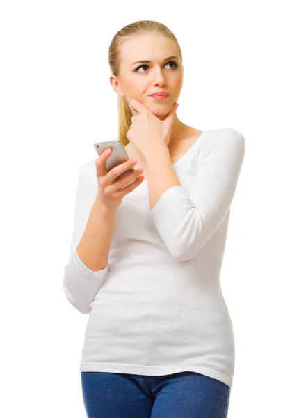 Worried young girl with mobile phone — Stock Photo, Image