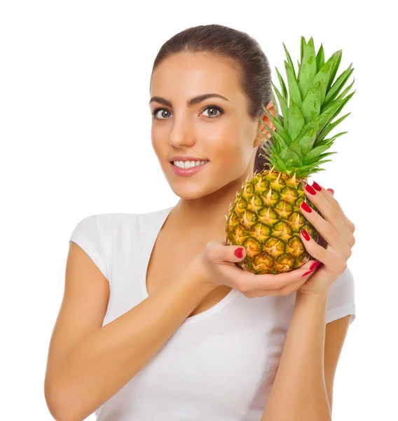 Young girl with pineapple — Stock Photo, Image