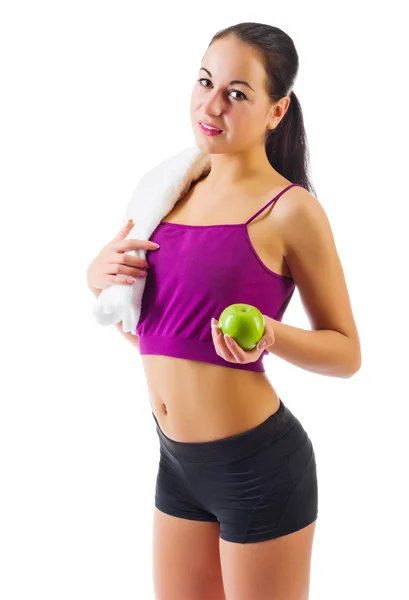 Sporty young girl with apple — Stock Photo, Image