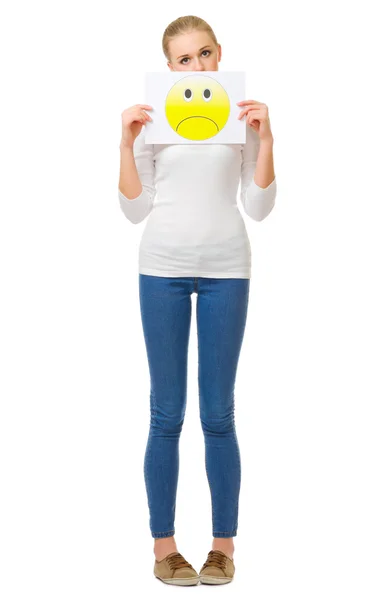 Young girl in jeans with sad poster — Stock Photo, Image