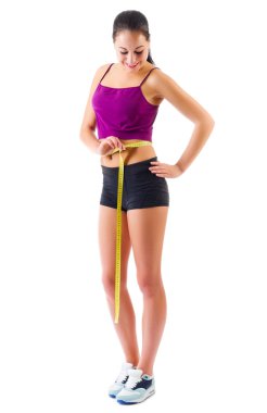 Ölçüm bandı ile sportif kız