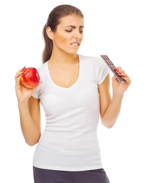 Mujer joven y saludable con manzana y chocolate — Foto de Stock