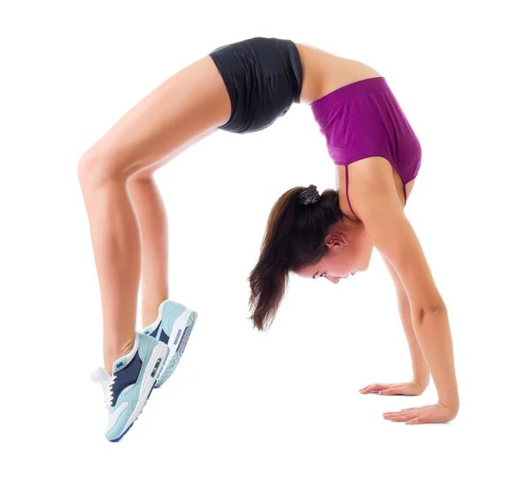 Sporty girl doing gymnastic exercises — Stock Photo, Image