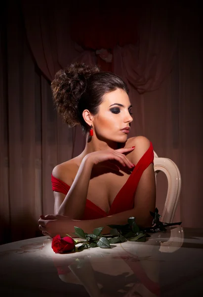 Portrait of woman in red dress — Stock Photo, Image