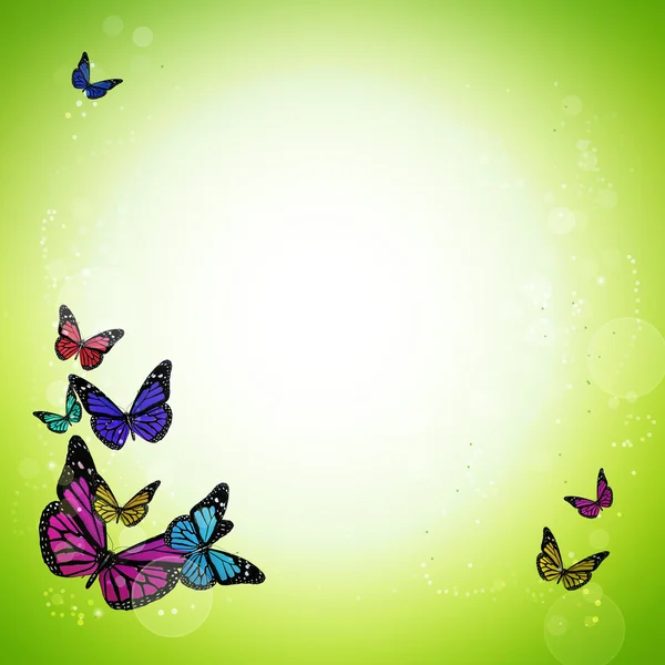 Весенний зеленый фон с красочными бабочками — стоковое фото
