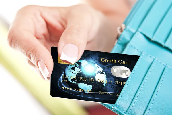 Credit card in woman's hand taken out from wallet — Stock Photo, Image