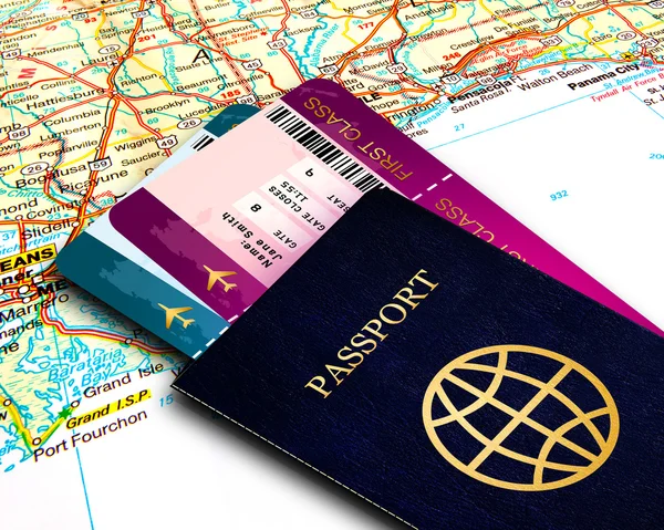 Passport and fly tickets over map background