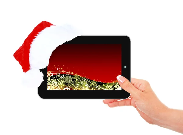 Hand holding ipad with christmas touch screen — Stock Photo, Image
