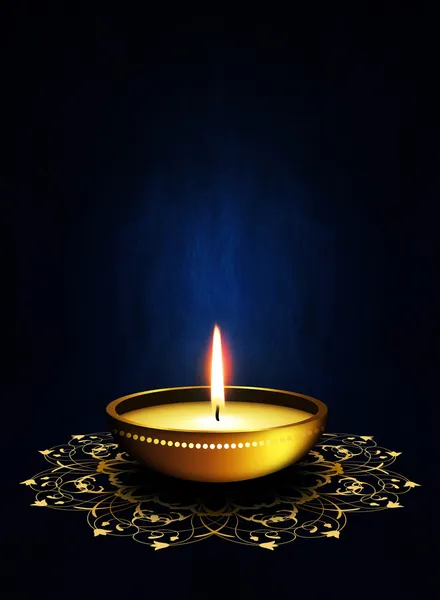 Oil lamp with place for diwali greetings over dark background — Stock Photo, Image