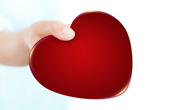 Valentine heart holded by hand isolated over white — Stock Photo, Image