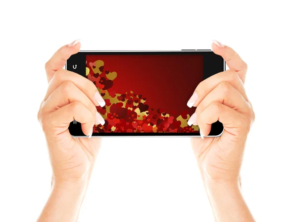 Hände, die Handy mit Valentinstag-Bildschirm halten — Stockfoto