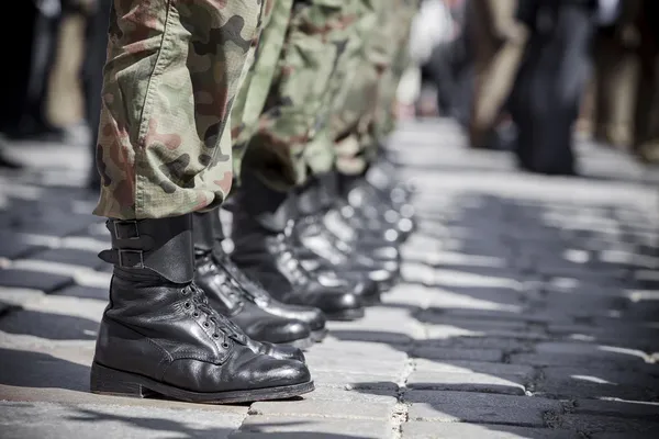 Desfile del ejército - botas de primer plano Imagen de archivo