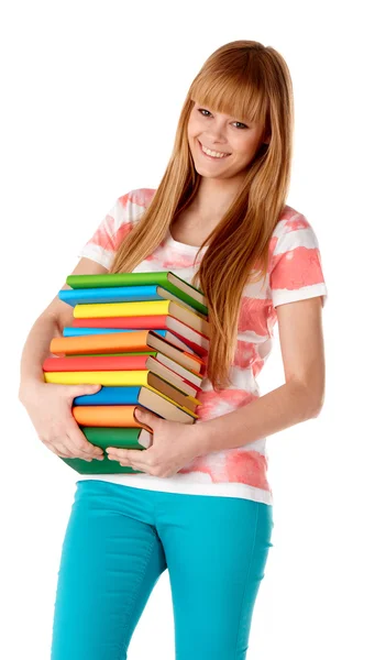 Retrato de linda chica con libro de texto en las manos mirando aislado sobre fondo blanco — Foto de Stock