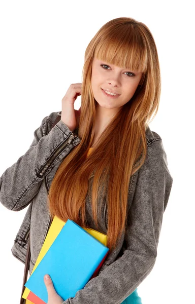 Retrato de linda chica con libro de texto en las manos mirando aislado sobre fondo blanco — Foto de Stock