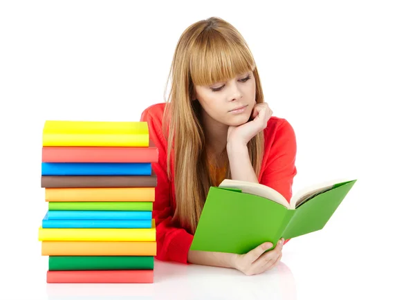 Jong meisje met boeken geïsoleerd op witte achtergrond — Stockfoto