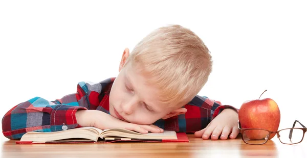 Kind leert de boeken een witte achtergrond. — Stockfoto