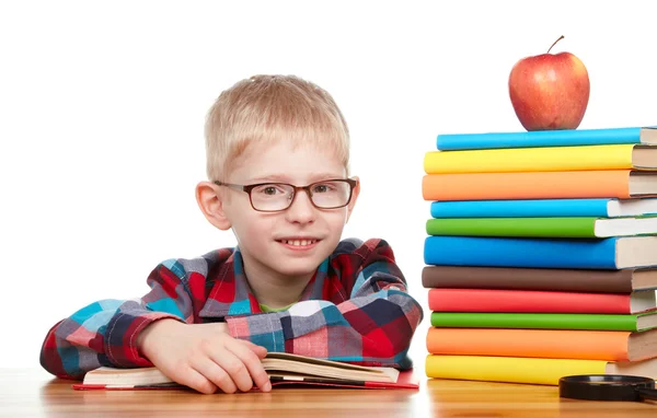 Child learns the books a white background. — Stock Photo, Image